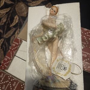 Elegant Green Ballerina Figurine